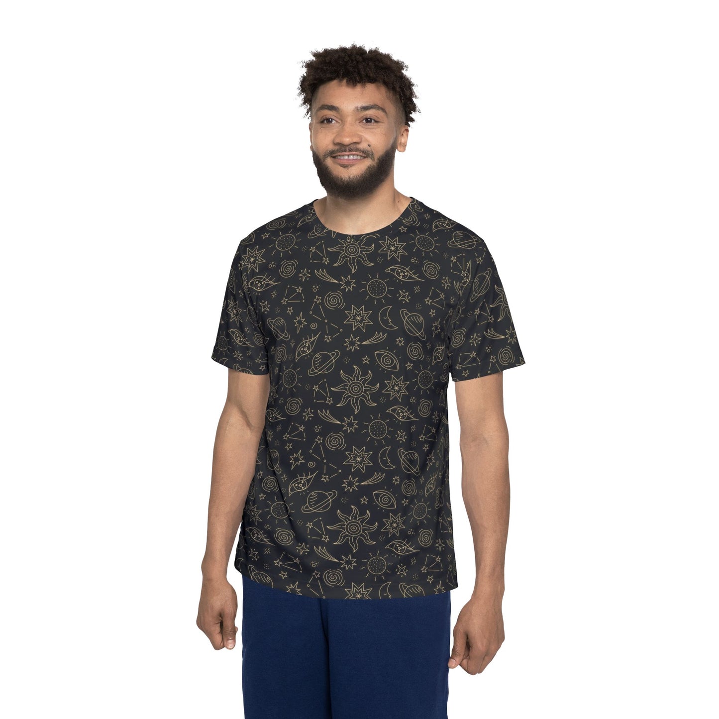 A man wearing a short-sleeve crewneck t-shirt with a dark charcoal background and a light beige celestial pattern of suns, moons, and stars, paired with navy blue pants, shot against a solid white background. Cosmic Space Celestial Pattern Men's Sports Jersey Active Wear Shop the Cosmic Space Celestial Pattern Men's Sports Jersey for an eye-catching galaxy look, athletic comfort, and everyday versatility. Stand out on and off the field with the Cosmic Space Celestial Pattern Men's Sports Jersey—bold.