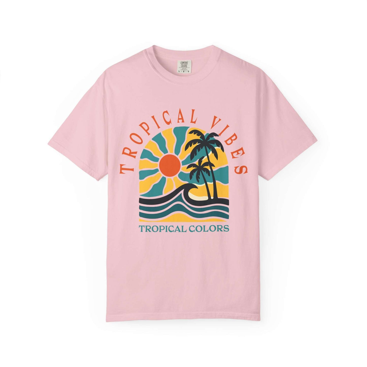 A light pink short-sleeve crewneck t-shirt featuring a retro tropical graphic on the front with palm trees, a sun, waves, and the text 'TROPICAL VIBES' and 'TROPICAL COLORS'. Tropical Vibes Summer Graphic Print T-Shirt Shop Tropical Vibes Summer Beach Graphic T-Shirt Casual Wear for breezy comfort, bold island-inspired style, and effortless sunny-day looks.