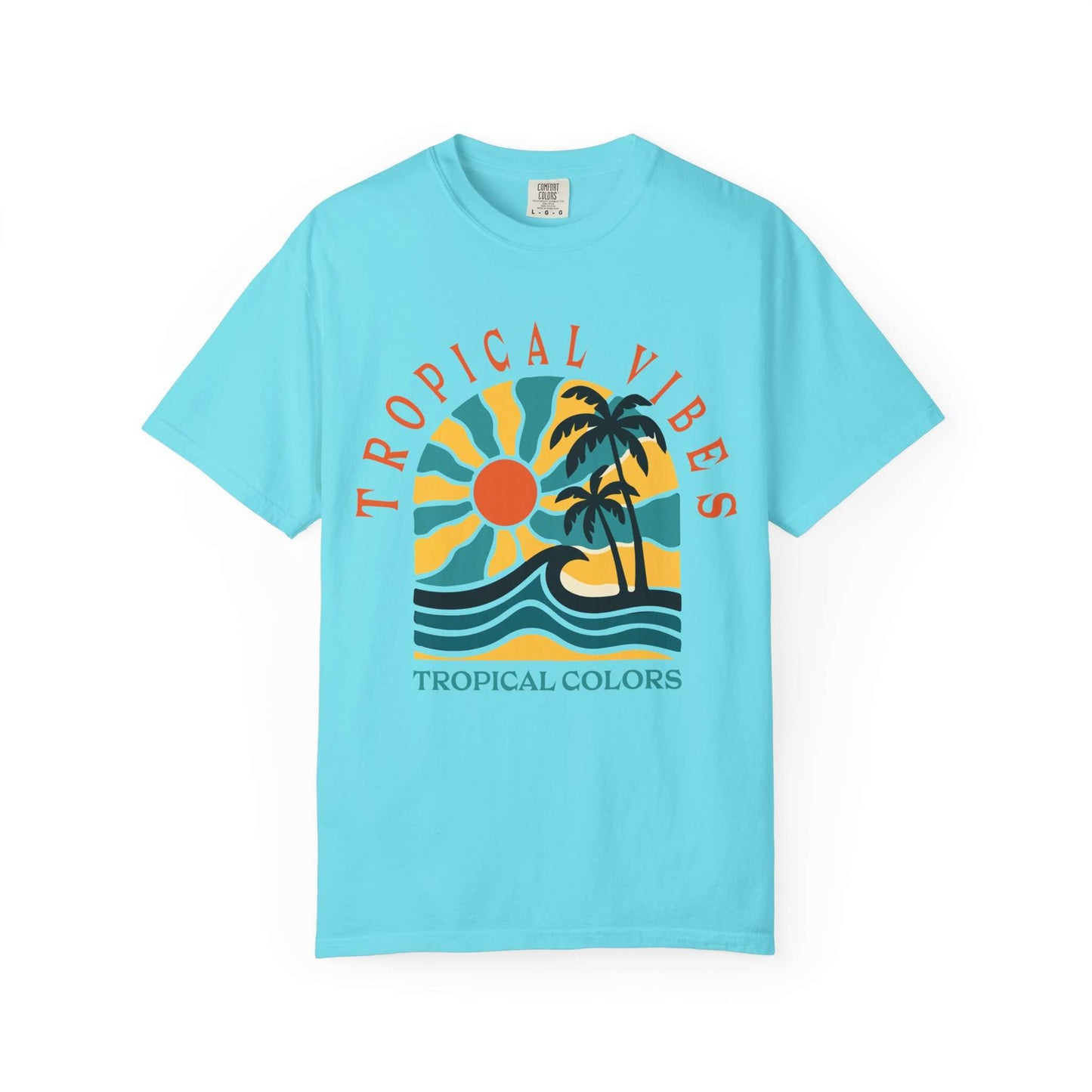 A light blue short-sleeve t-shirt with a retro tropical graphic on the chest featuring a sun, palm trees, waves, and the text 'TROPICAL VIBES' and 'TROPICAL COLORS'. Tropical Vibes Summer Graphic Print T-Shirt Shop Tropical Vibes Summer Beach Graphic T-Shirt Casual Wear for breezy comfort, bold island-inspired style, and effortless sunny-day looks.
