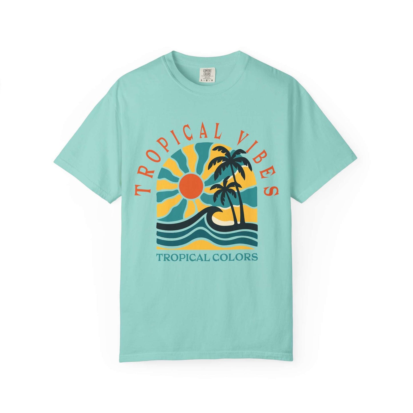 A light aqua short-sleeve t-shirt with a retro tropical graphic on the chest. The graphic features a yellow and blue sun, two black palm trees, and blue waves, with the text 'TROPICAL VIBES' arched above and 'TROPICAL COLORS' printed below. Tropical Vibes Summer Graphic Print T-Shirt Shop Tropical Vibes Summer Beach Graphic T-Shirt Casual Wear for breezy comfort, bold island-inspired style, and effortless sunny-day looks.