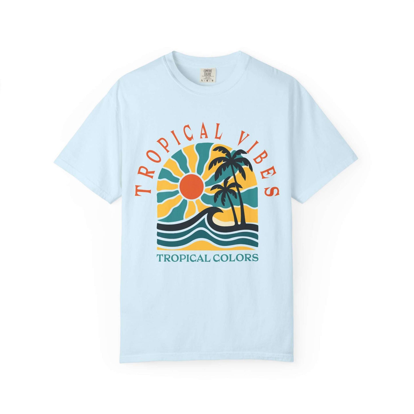 A light blue short-sleeve t-shirt with a retro tropical graphic on the chest featuring a sun, palm trees, waves, and the text 'TROPICAL VIBES' and 'TROPICAL COLORS'. Tropical Vibes Summer Graphic Print T-Shirt Shop Tropical Vibes Summer Beach Graphic T-Shirt Casual Wear for breezy comfort, bold island-inspired style, and effortless sunny-day looks.