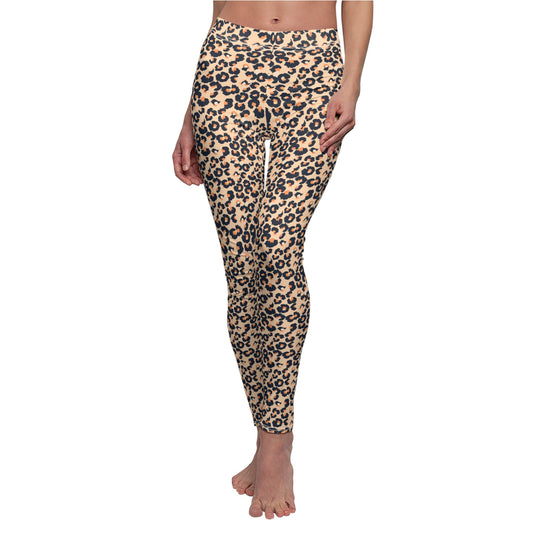 A person modeling patterned leggings against a plain white background. The leggings have a black and white striped base with a colorful tropical floral print in pink, yellow, green, and orange. Comfortable Leopard Print Women's Casual Leggings Activewear