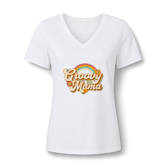 A white women's short-sleeve V-neck t-shirt featuring a retro-style 'Groovy Mama' graphic on the chest with a rainbow and gold lettering, displayed on a clean white background.