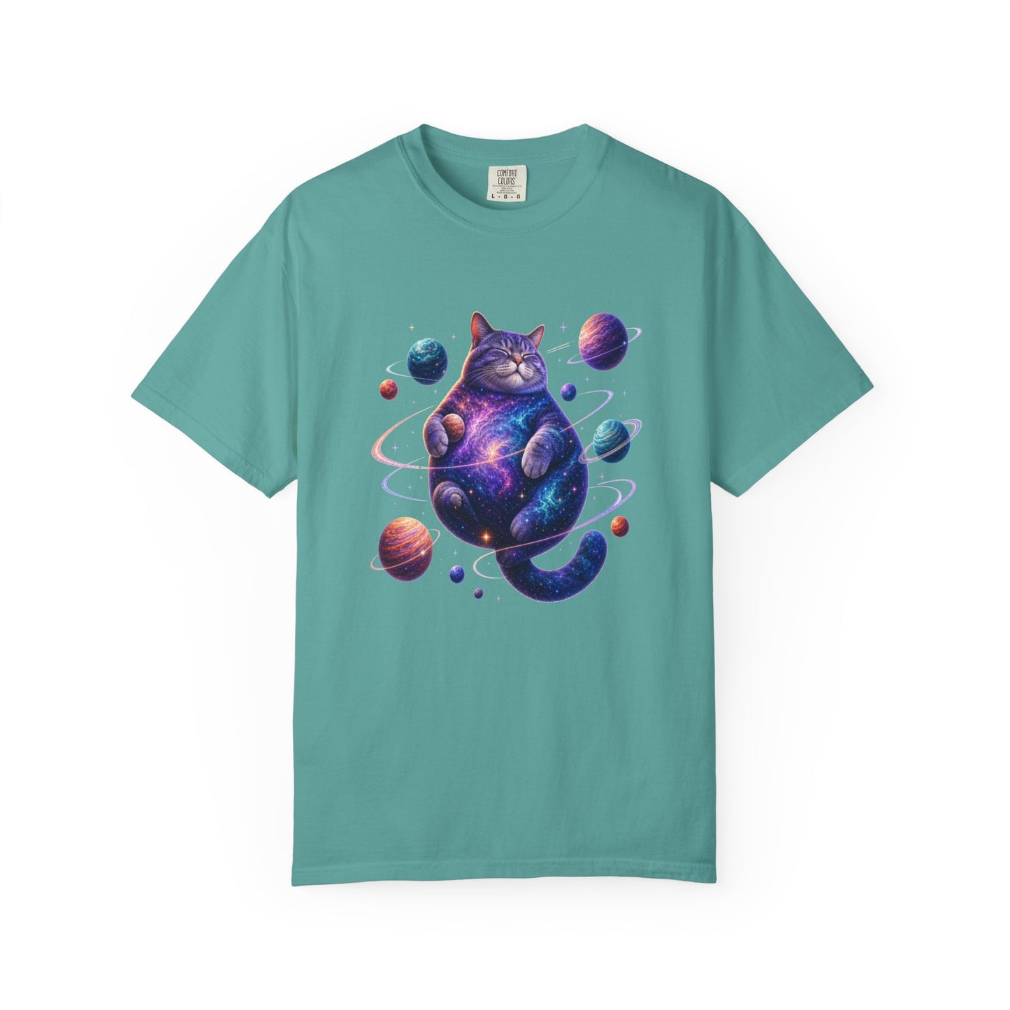 A teal short-sleeve crewneck t-shirt featuring a colorful graphic of a cosmic, galaxy-patterned cat surrounded by planets, displayed on a clean white background. Cosmic Celestial Feline: Space-Themed Cat T-Shirt for Casual Wear