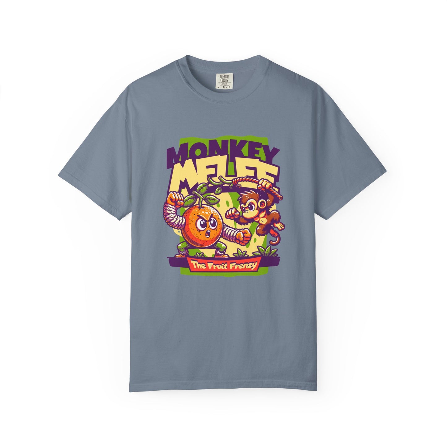 A slate blue crewneck t-shirt featuring a colorful cartoon graphic on the front with the text 'MONKEY MELEE' and 'The Fruit Frenzy' depicting a cartoon monkey and an orange. Fun and Funky Monkey-Themed Graphic Tee