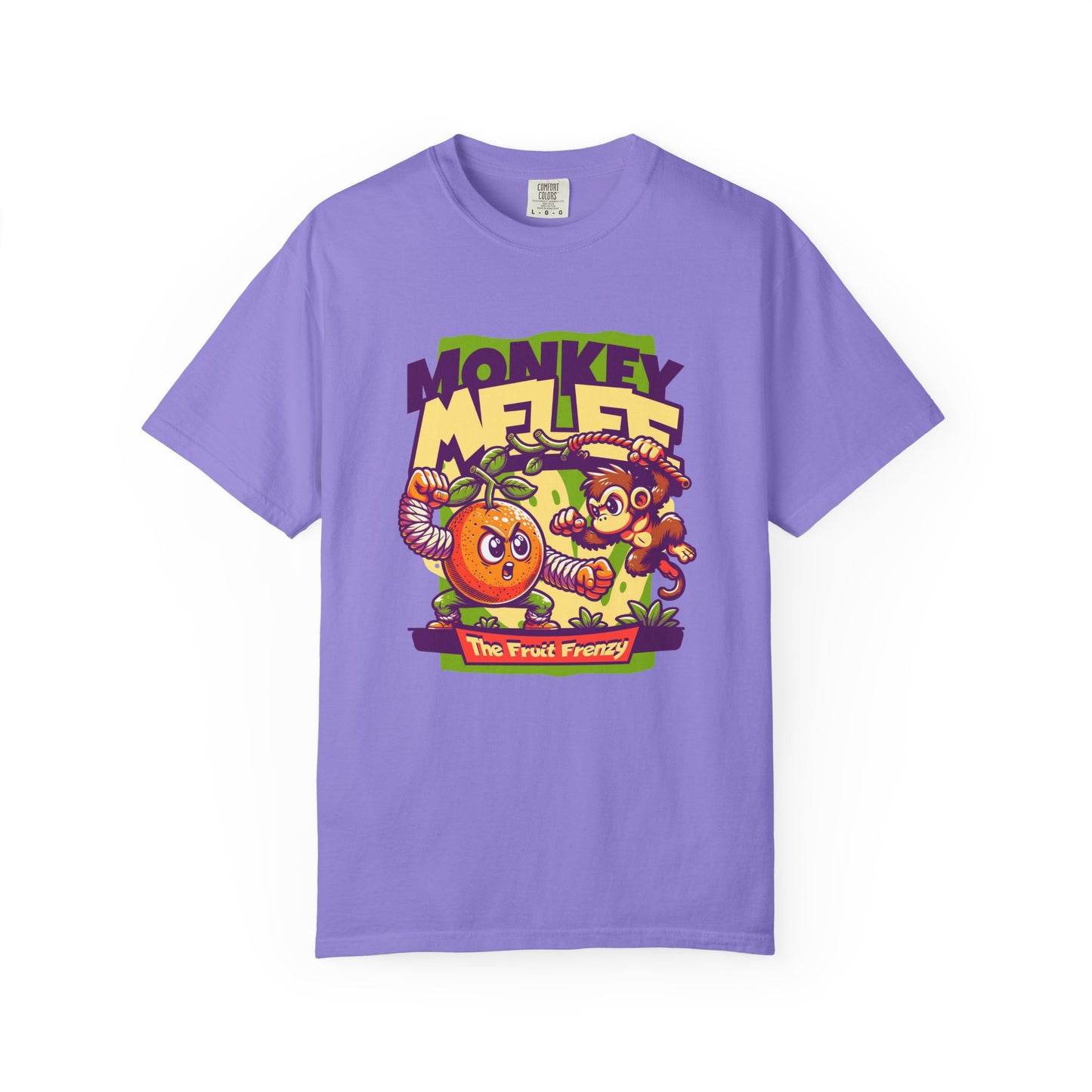 A purple short-sleeve crewneck t-shirt featuring a colorful cartoon graphic on the front with the text 'MONKEY MELEE' and 'The Fruit Frenzy' depicting a monkey, an orange, and a banana. Jungle Chaos: Monkeys and Fruits Clash