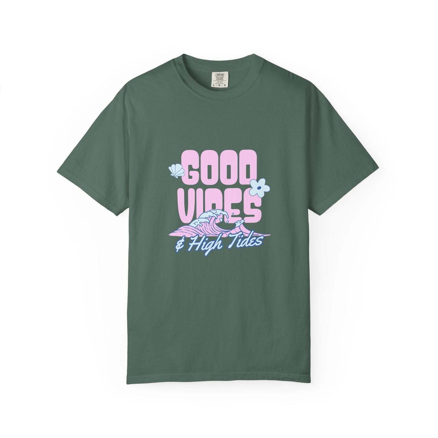 A dark green short-sleeve t-shirt with a retro-style graphic on the chest reading 'GOOD VIBES & High Tides' in pink and light blue, featuring a pink and blue wave and a small blue flower.