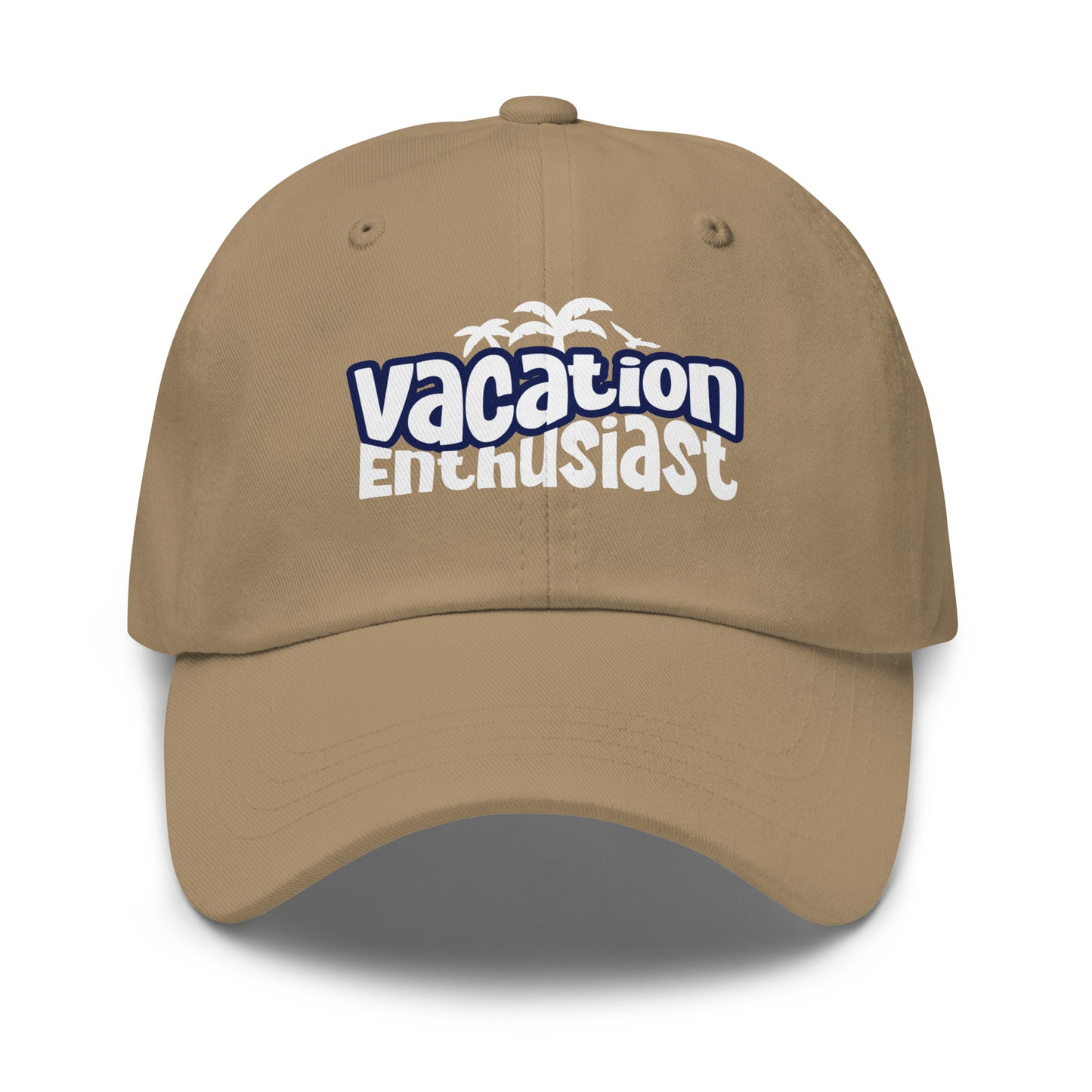 A tan baseball cap with a curved brim, featuring a 'vacation Enthusiast' graphic printed on the front in blue and white with a small palm tree motif above the text. Retro Vacation Enthusiast Bold Graphic Classic Dad Cap