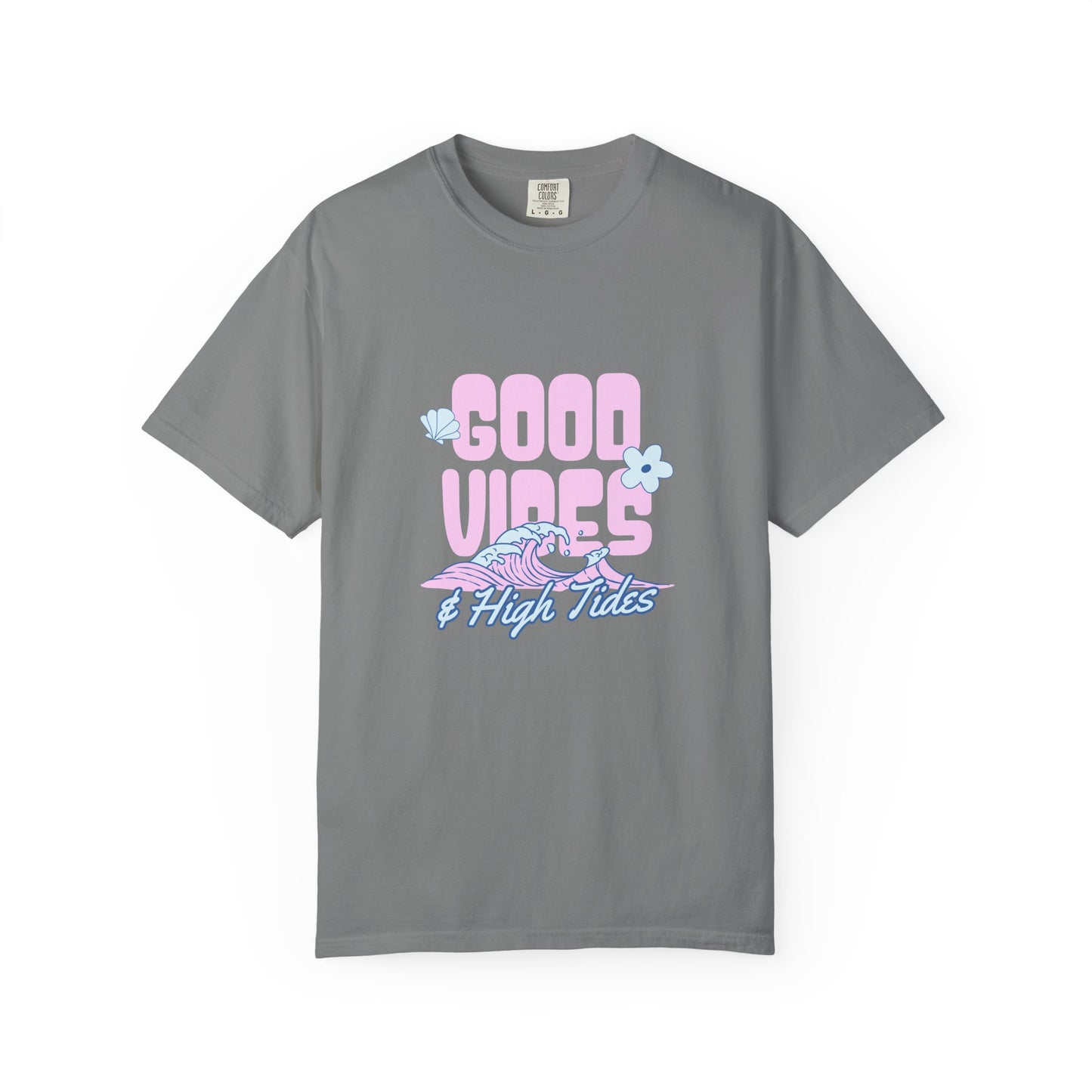 A gray short-sleeve crewneck t-shirt featuring a retro-style graphic on the chest that reads 'GOOD VIBES & High Tides' in pink and blue, accompanied by a pink and blue wave illustration and small light blue flowers.