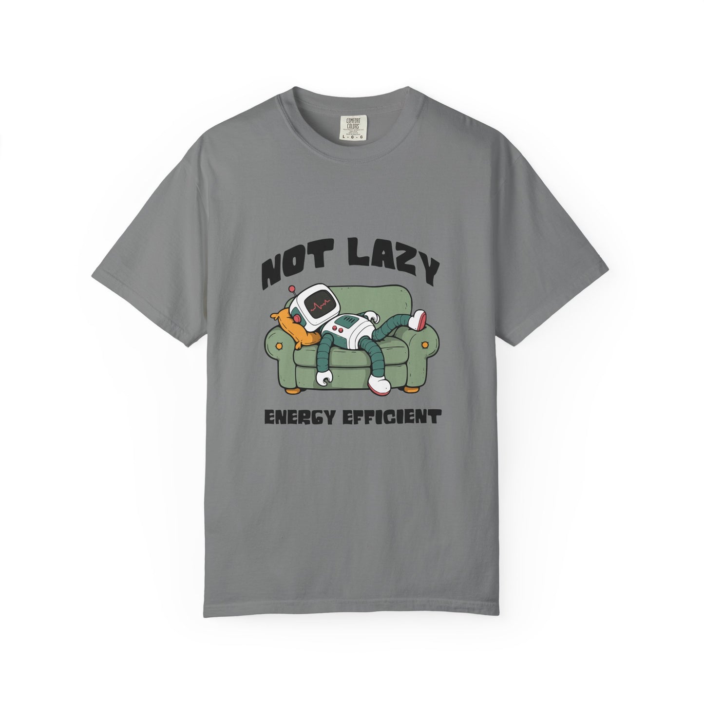 A gray short-sleeve crewneck t-shirt featuring a cartoon graphic of a person relaxing on a green couch with a retro computer, with the text 'NOT LAZY ENERGY EFFICIENT' printed in black.