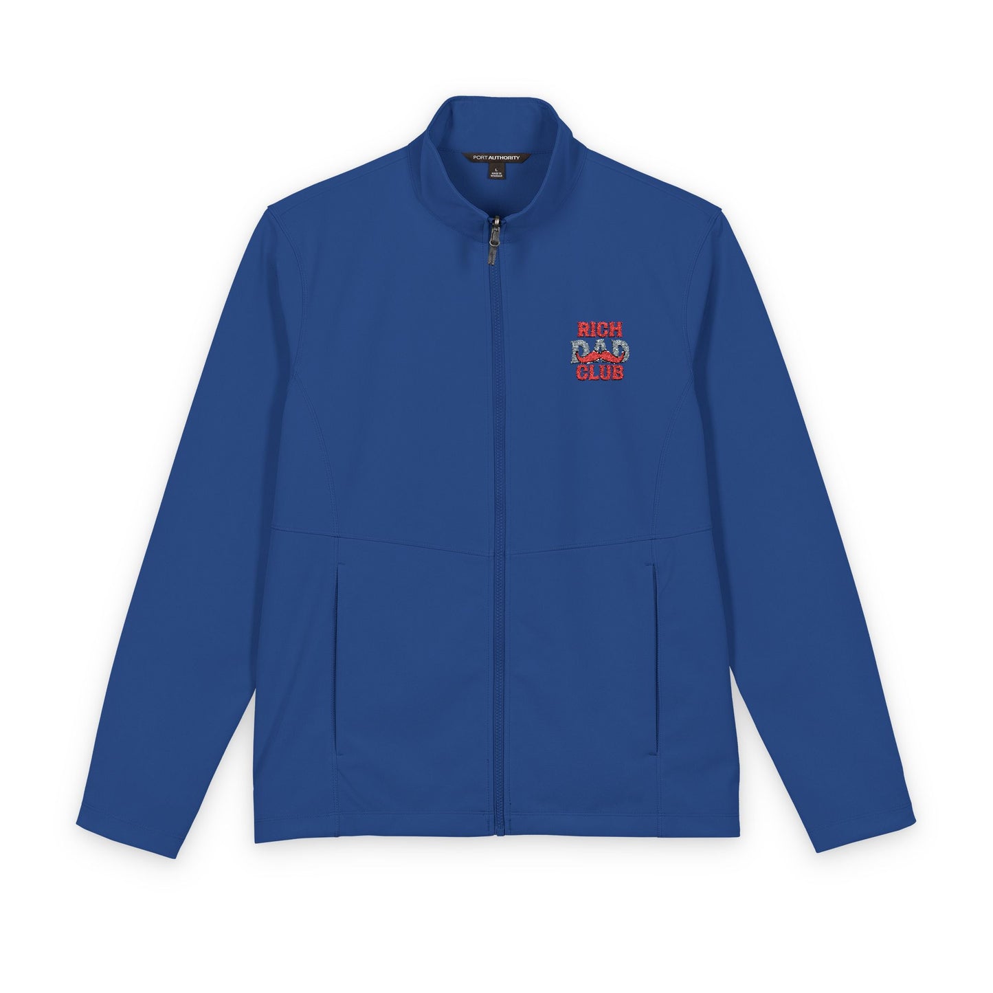 A royal blue zip-up jacket with a stand collar, featuring a small red and white embroidered graphic on the left chest that reads 'RICH BAD DAY' with a pig illustration. The jacket is displayed flat against a solid white background.