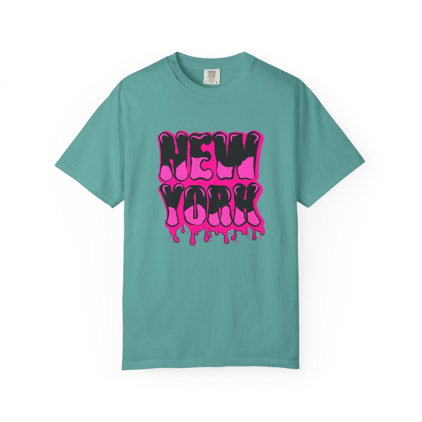 A teal short-sleeve t-shirt with a vibrant pink and black dripping 'NEW YORK' graphic on the front, displayed against a clean white background. Trendy Bold Graffiti Lettering New York Typography T-Shirt for Casual Wear