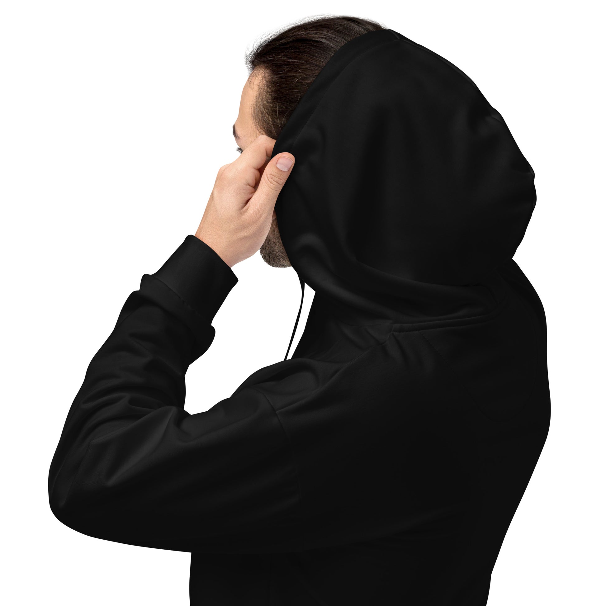 Person wearing a black hoodie with their face obscured Trendy Bold Minimalist Solid Plain Dark Black Hoodie for Casual Wear