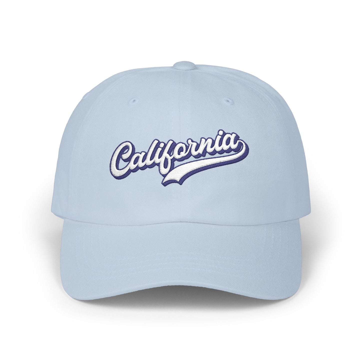 A light blue baseball cap featuring 'California' embroidered in white script with a dark blue outline across the front panels, set against a plain white background. Trendy California Typography Embroidered Classic Dad Cap