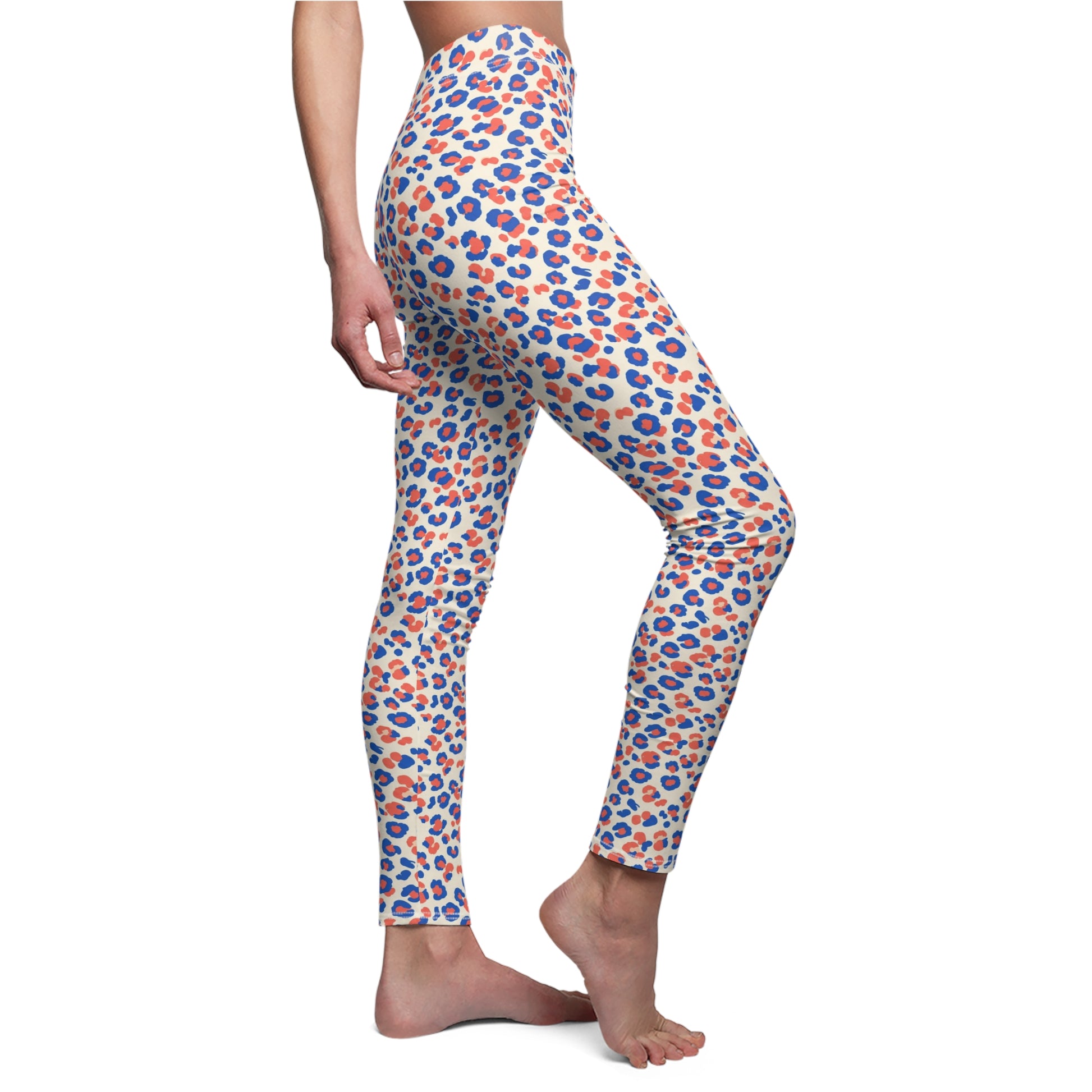 A person modeling high-waisted leggings with an allover leopard print pattern in blue, orange, and white, shown from the waist down against a plain white background. Trendy Colorful Pastel Leopard Print Leggings Casual Wear