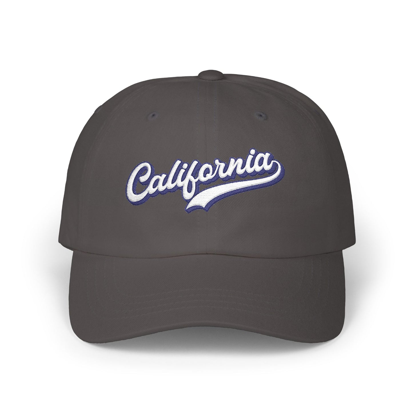 A dark gray baseball cap featuring 'California' embroidered in white script with a blue outline on the front, set against a plain white background. Unique California Typography Embroidered Classic Dad Cap