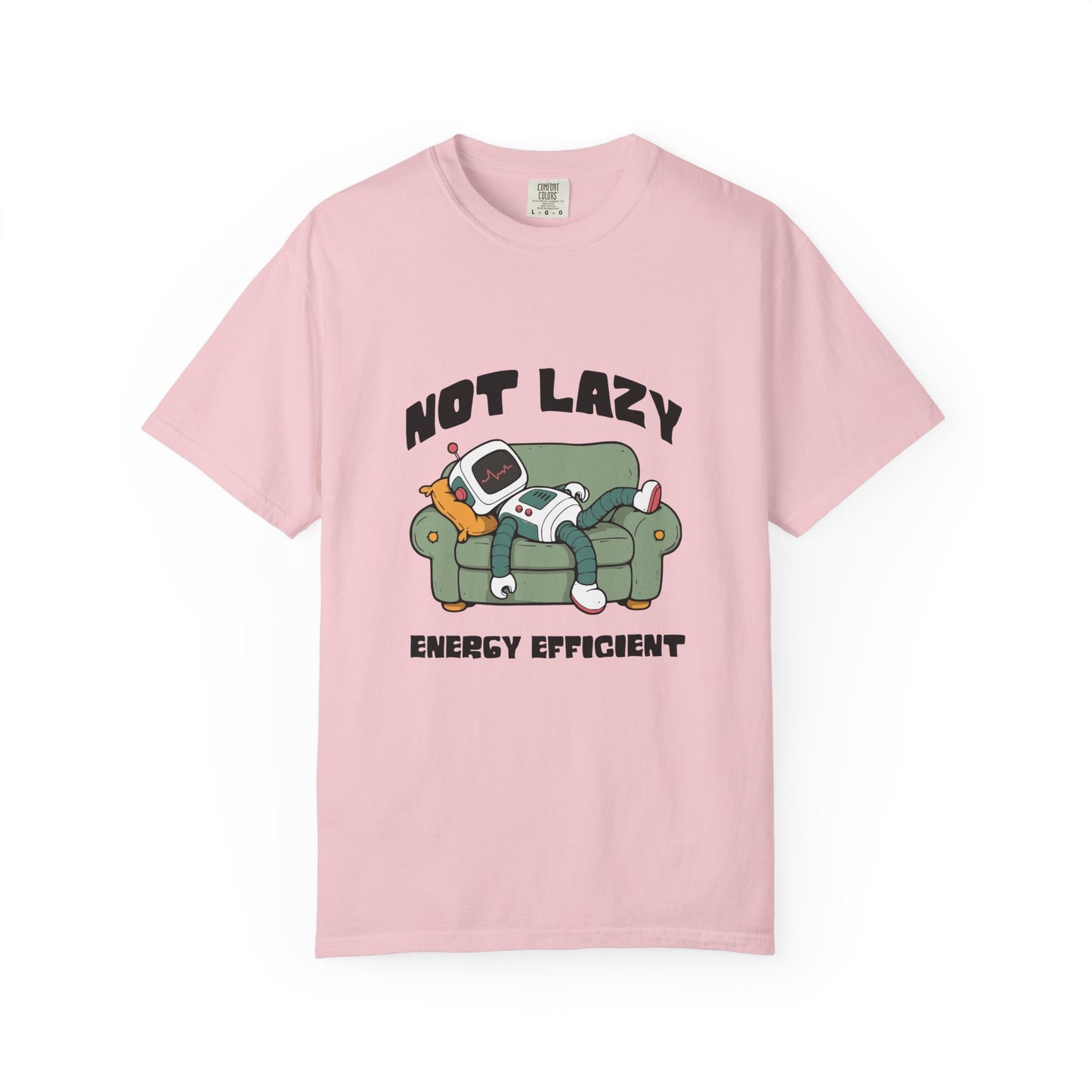 A light pink short-sleeve crewneck t-shirt featuring a cartoon graphic of a sleeping robot on a green couch with the text 'NOT LAZY ENERGY EFFICIENT'. Unique Not Lazy, Energy Efficient, Robot Lounge Sarcasm T-Shirt for Casual Wear