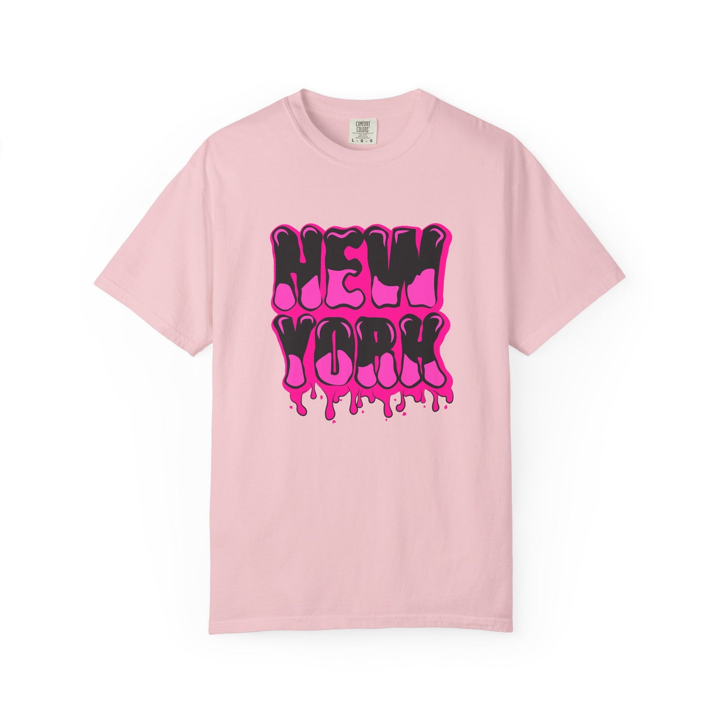 A light pink short-sleeve crewneck t-shirt featuring a bold 'NEW YORK' graphic in dripping hot pink bubble letters with black outlines, displayed on a clean white background. Urban Street Art Bold Graffiti Lettering New York Typography T-Shirt for Casual Wear