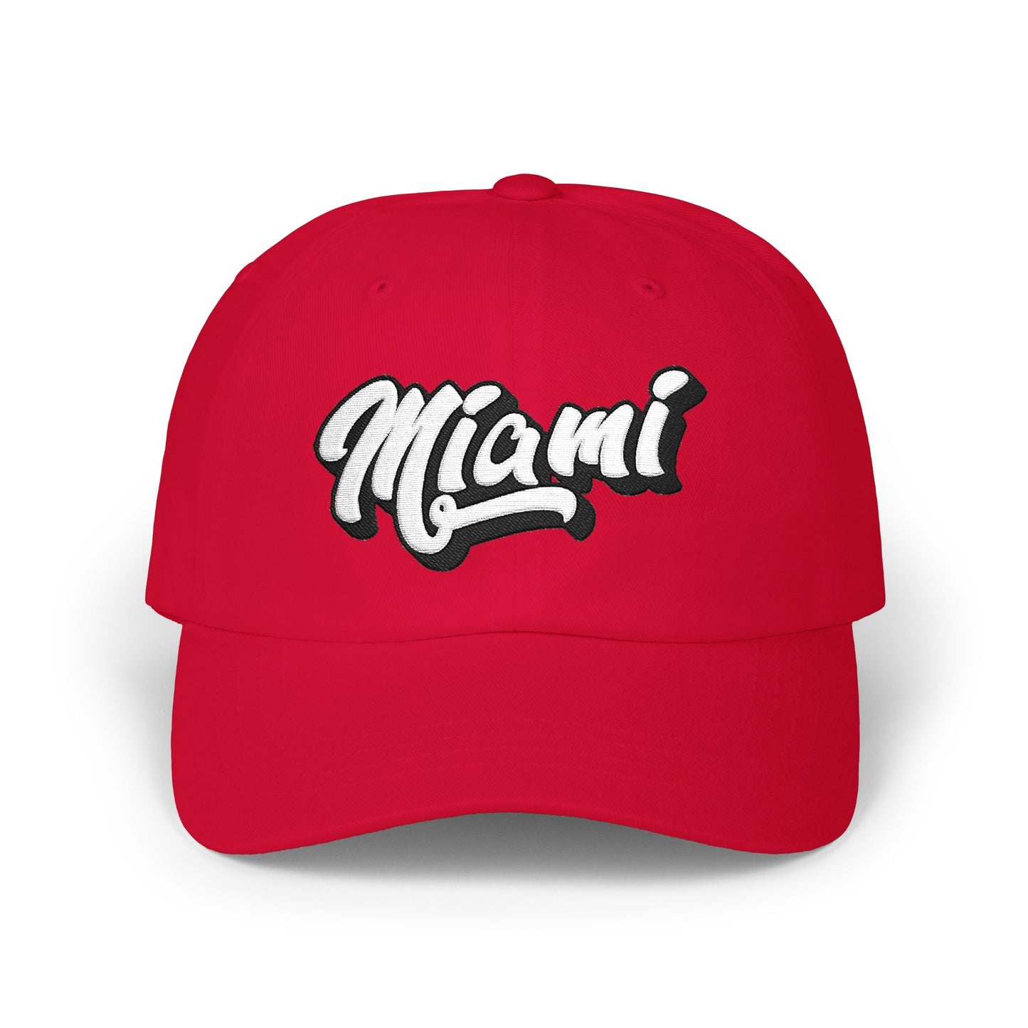 A red baseball cap featuring the word 'Miami' in a white cursive font with a black outline on the front, set against a plain white background. Versatile Minimalist Miami Beach Typography Classic Dad Cap