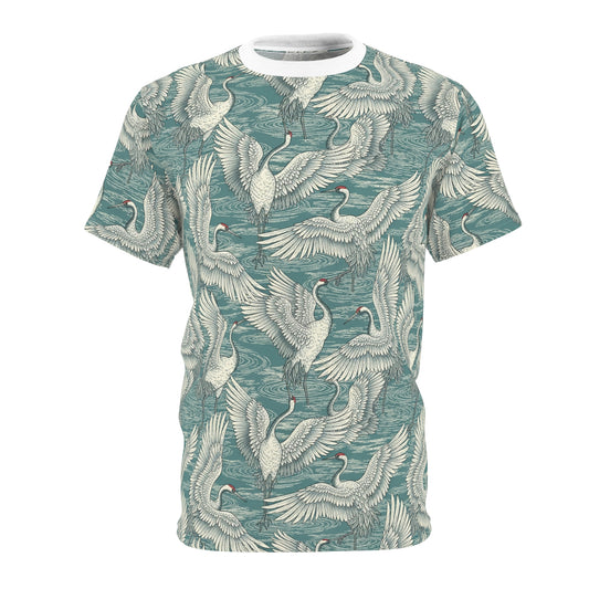 A short-sleeve crewneck t-shirt featuring an all-over print of white cranes on a textured teal watercolor background, shown against a plain white studio backdrop. Vintage Japanese Crane Pattern T-Shirt for Casual Wear