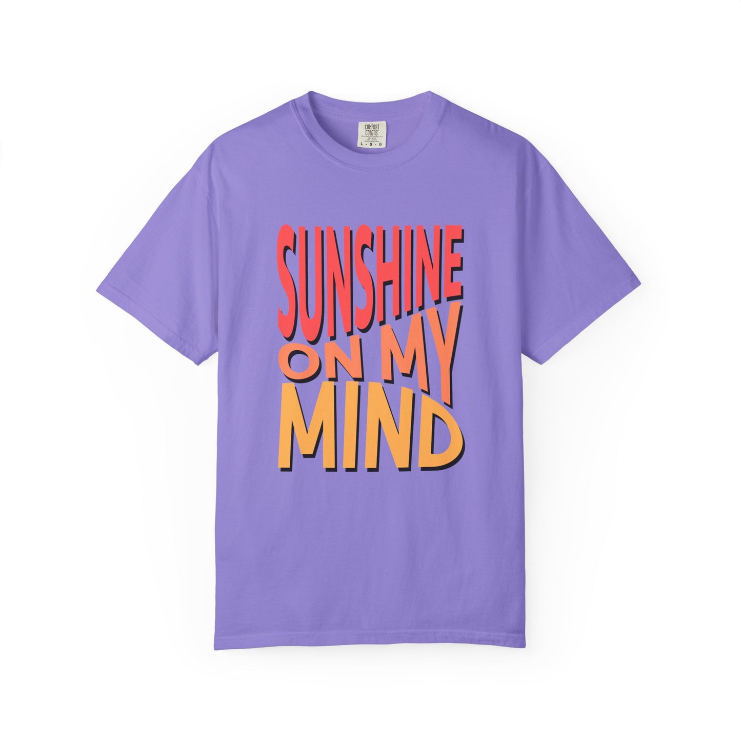 A purple short-sleeve crewneck t-shirt featuring a bold graphic text print on the front that reads 'SUNSHINE ON MY MIND' in red, orange, and yellow 3D-style lettering, displayed against a solid white background. Vintage Sunshine On My Mind Summer Vibes Graphic T-Shirt for Casual Wear
